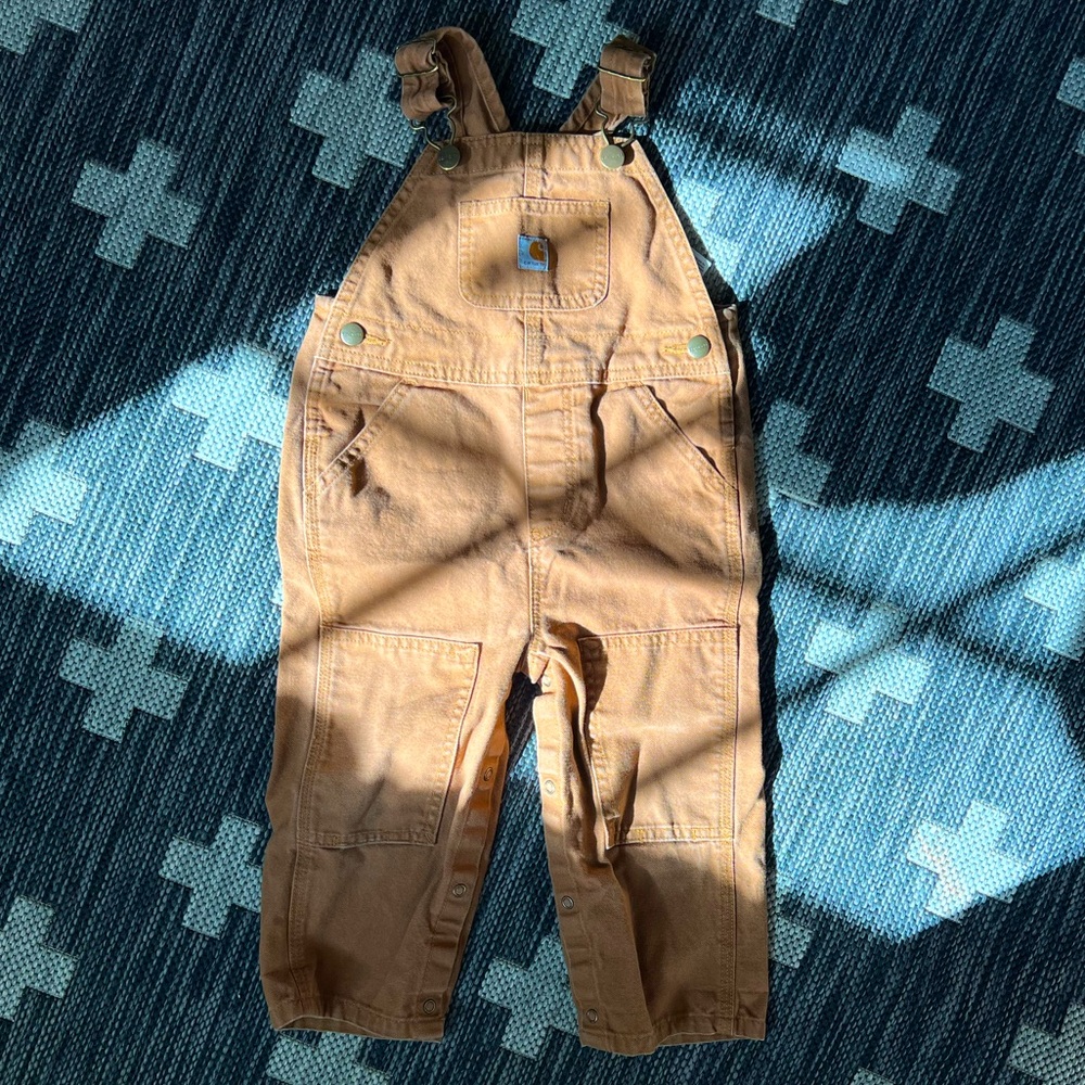 Carhartt canvas overalls. Brown. 
24 months